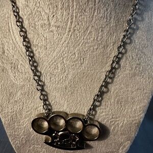 Skull Brass Knuckle Pendant Necklace in Silver